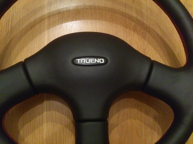 Trueno badge on steering wheel